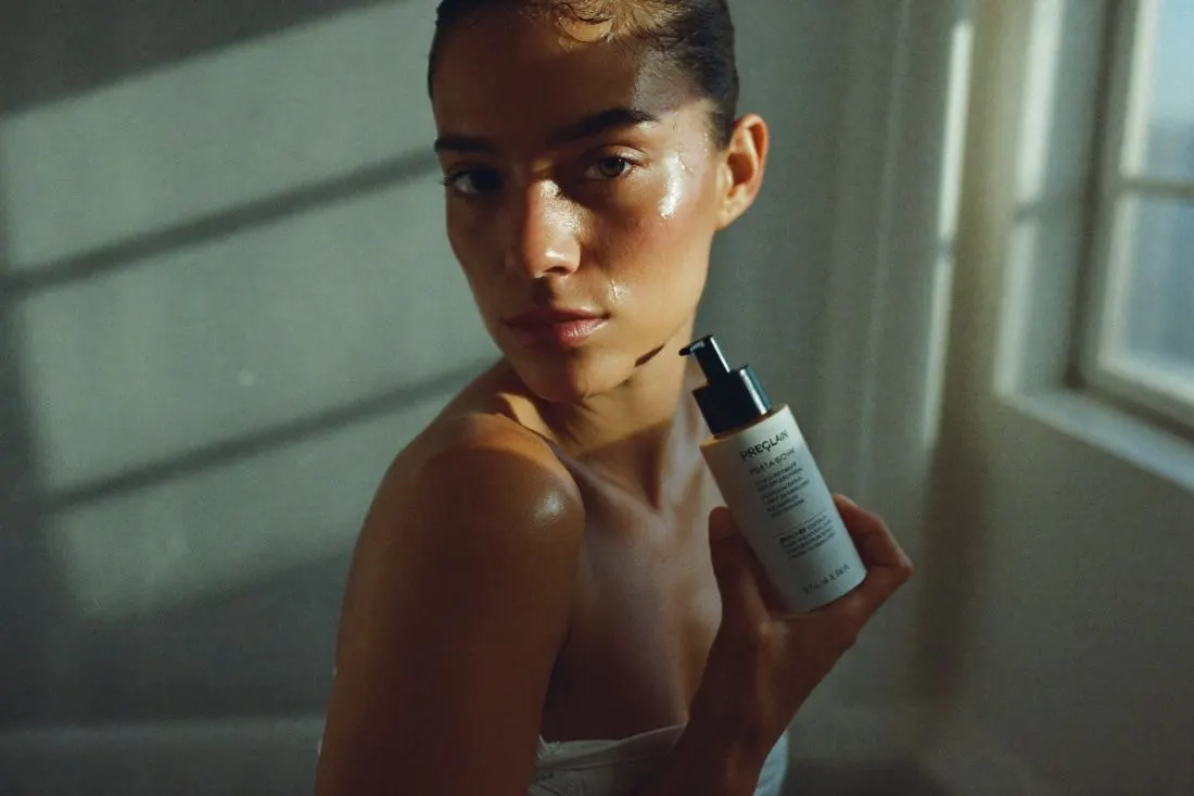 Beauty portrait in hard window light, landscape crop